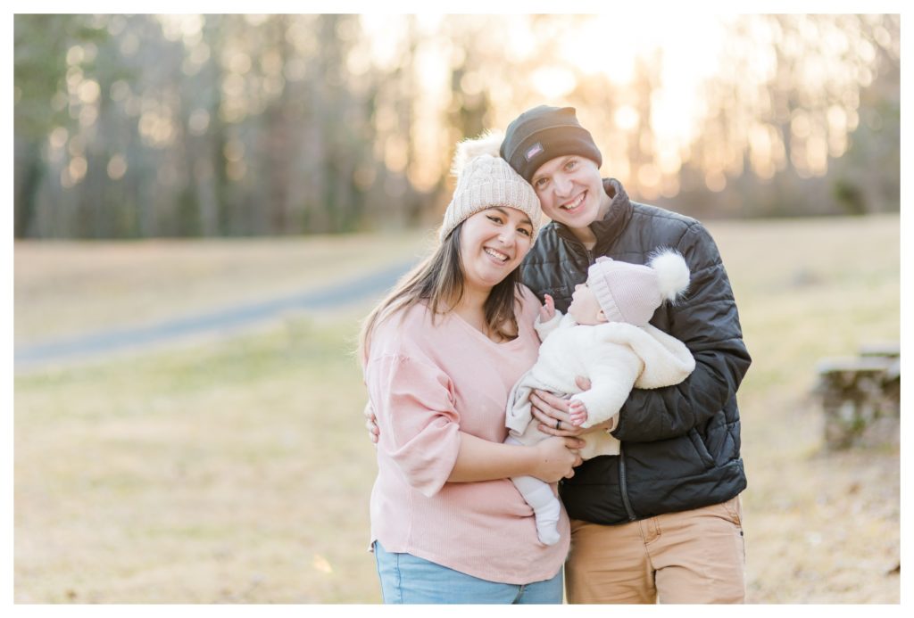 Winter Family Photos at Sugarloaf Mountain in Maryland - couple and baby girl with winter hats