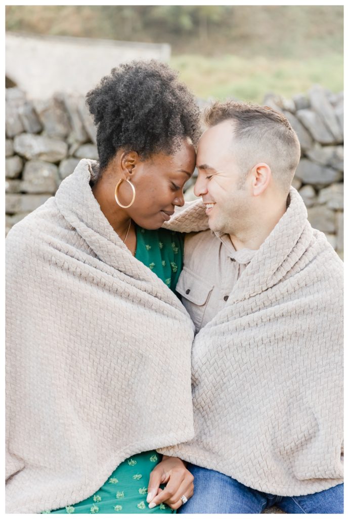 Romantic Anniversary Photos Antietam MD - couple snuggles under a blanket