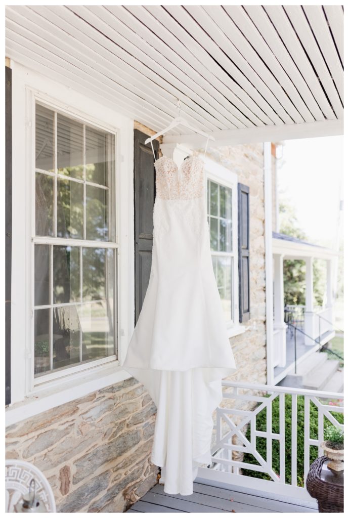 Elegant Springfield Manor Wedding Photography - bride's dress hanging