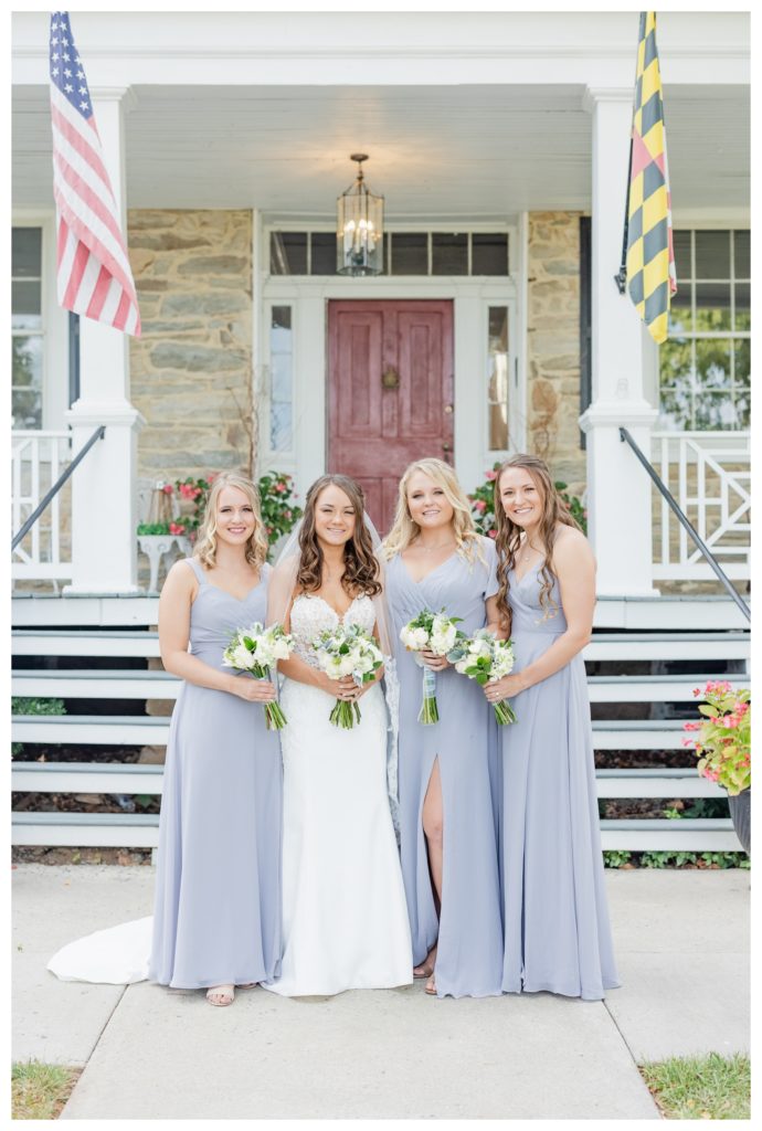 Elegant Springfield Manor Wedding Photography - bride smiling with bridesmaids