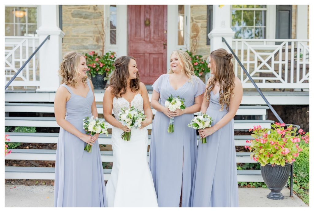 Elegant Springfield Manor Wedding Photography - bride and bridesmaids laughing
