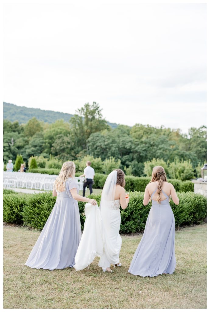 Elegant Springfield Manor Wedding Photography - bride and bridesmaids walking