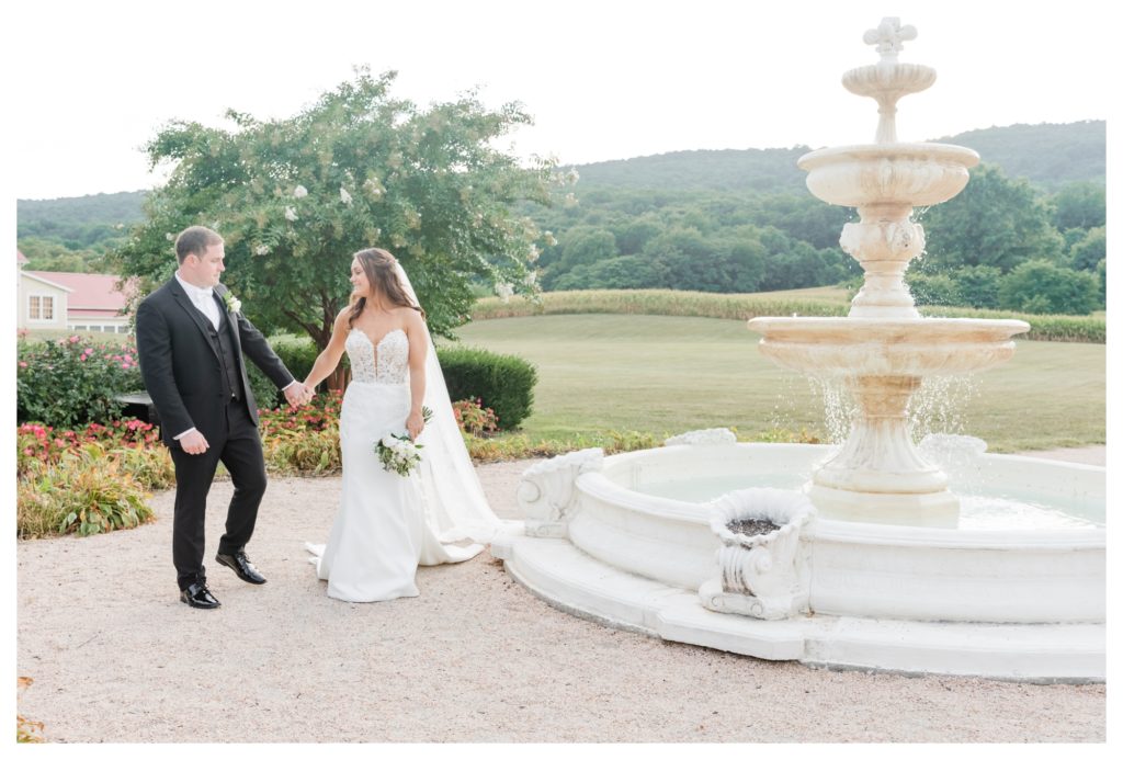Elegant Springfield Manor Wedding Photography - husband and wife portrait in front of fountain
